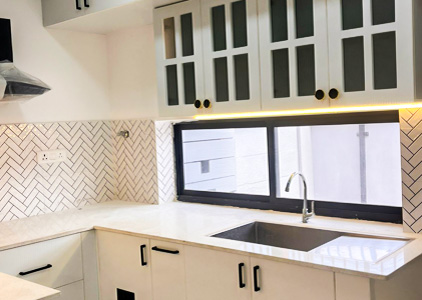 Modular Kitchen with Patterned Backsplash