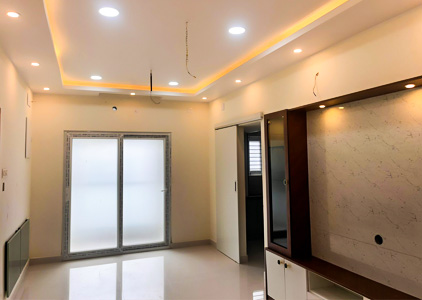 False ceiling with warm lights and TV unit